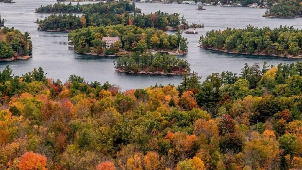 Tourist places in Canada highlighting Thousand Islands aerial view with bridges and island cottages