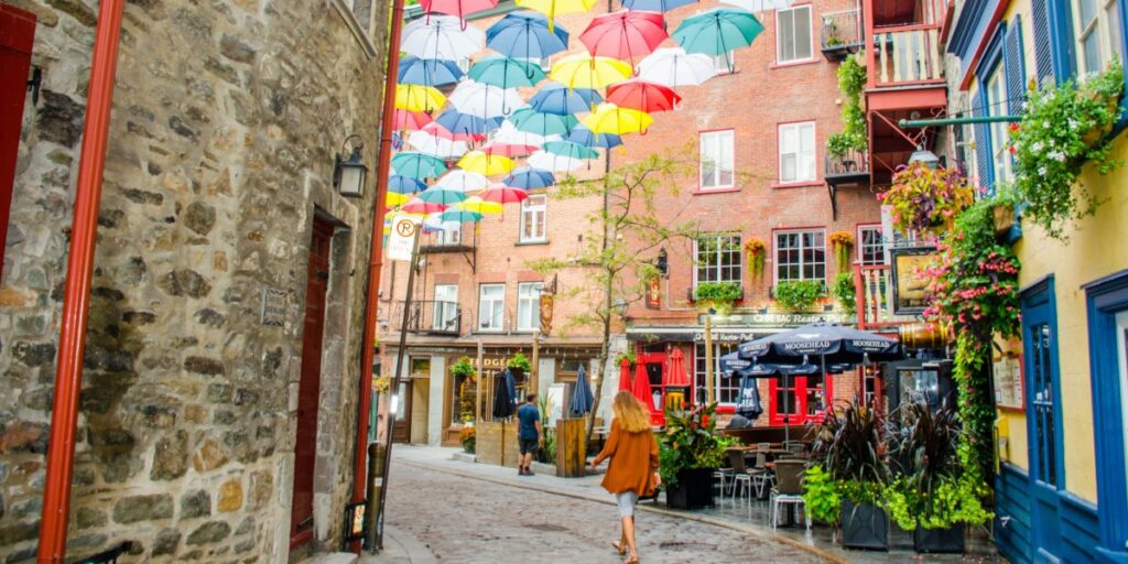 Quebec City as one of the top tourist places in Canada showing cobblestone streets and European-style architecture